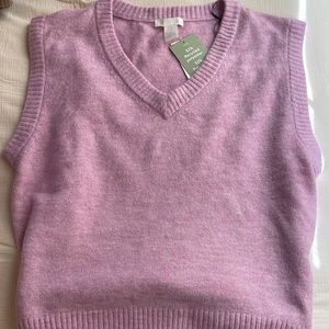 Pink sweater vest